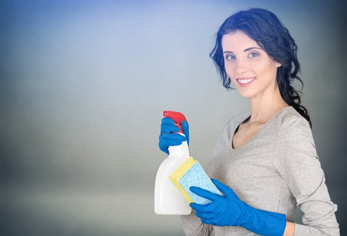 Technician inspecting upholstered furniture before cleaning
